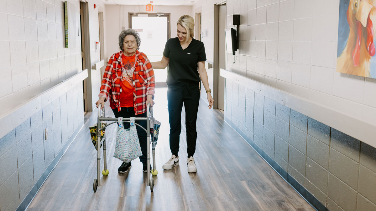 Therapist Helping Elder at Pocahontas Healthcare and Rehabilitation Center